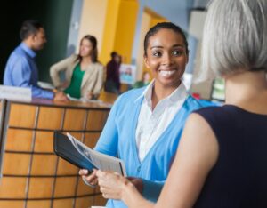 Woman smiling at another woman